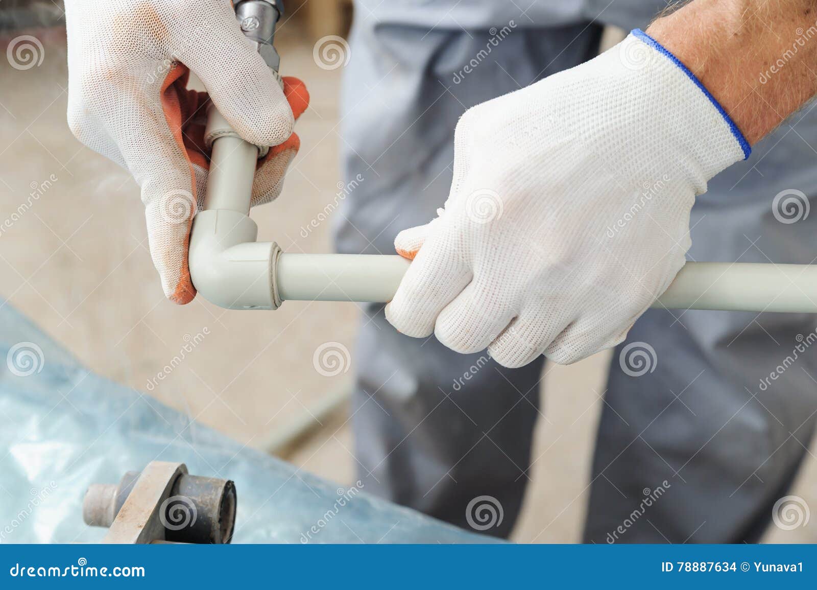 Soldering plastic pipe. stock photo. Image of heat, installation 78887634