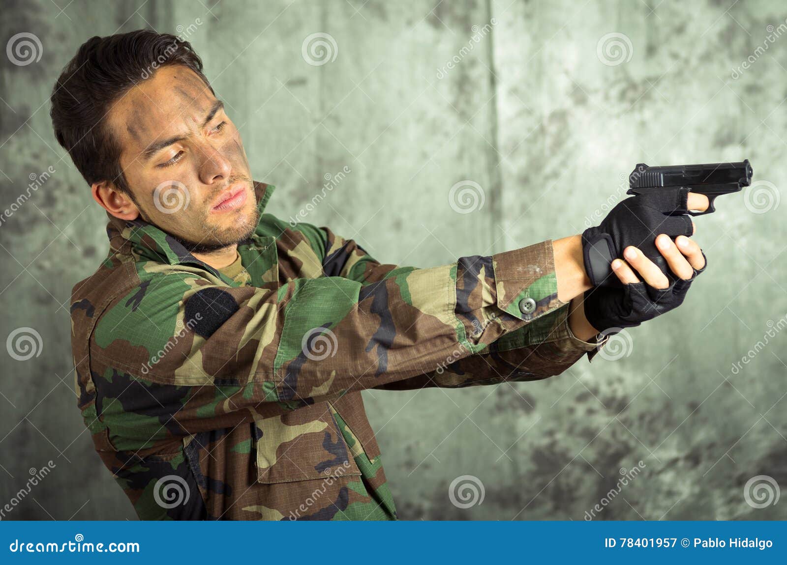 soldier militar latin man pointing a gun