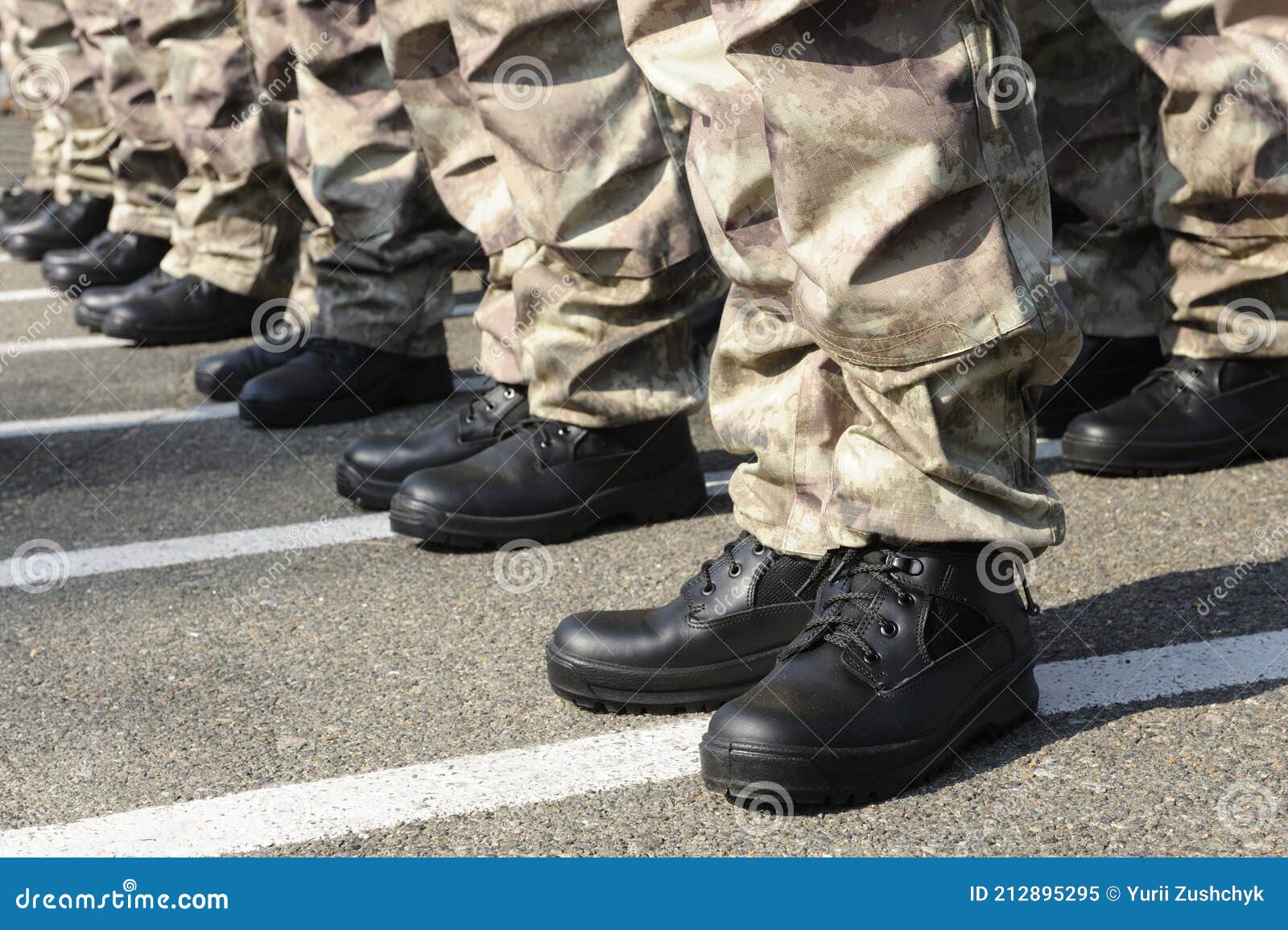 Soldiers Feet in Black Ammunition Boots Standing in a Line on the ...