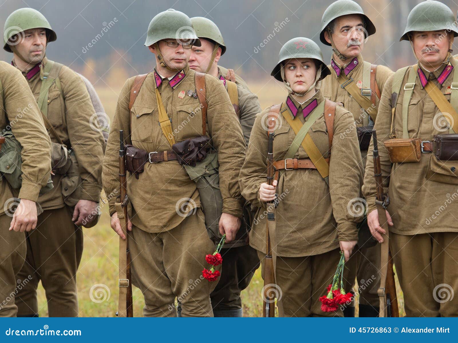 Soldiers with flowers editorial stock photo. Image of history - 45726863