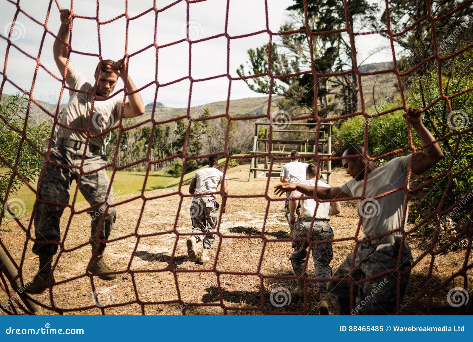 soldiers performing training exercise on net