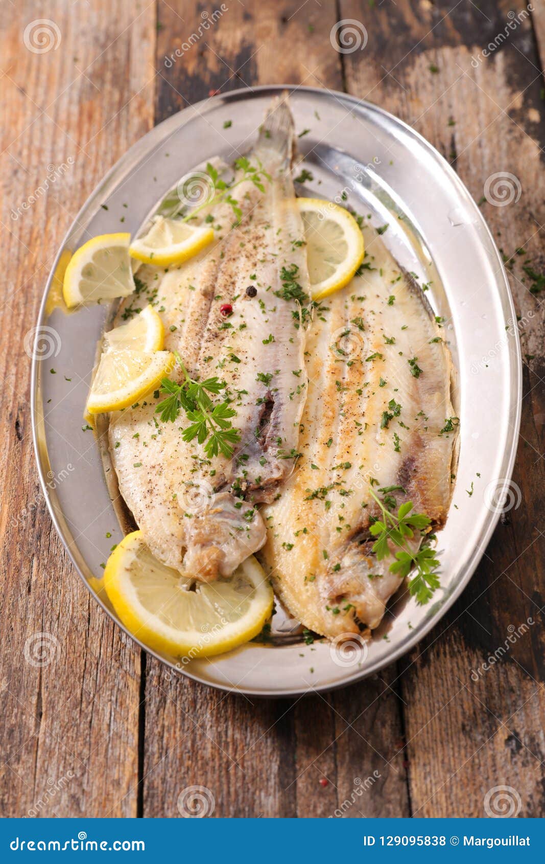Sole fish cooked with herb stock photo. Image of dinner 129095838