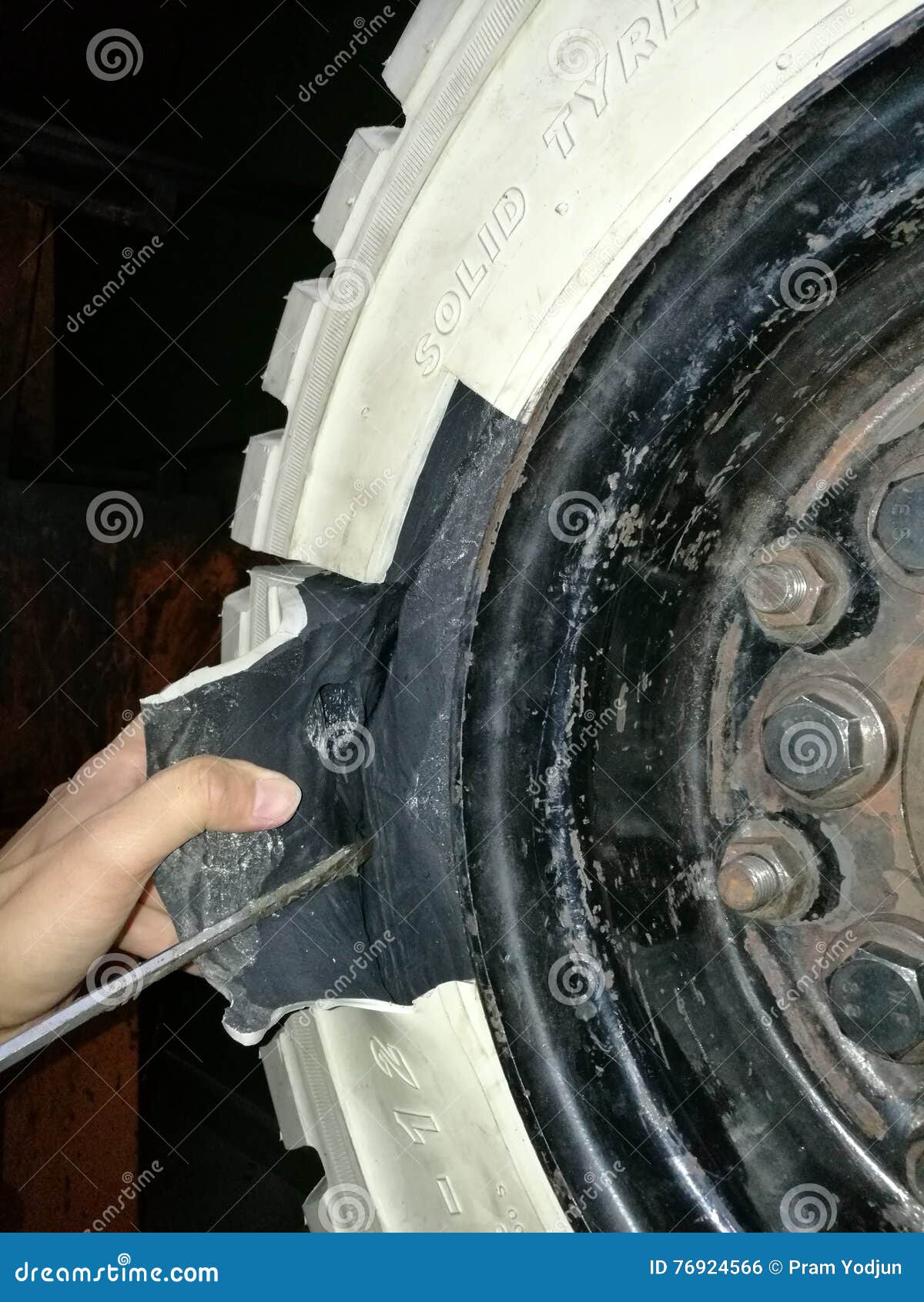 Solid tyre cracking stock photo. Image of worker, crate 76924566