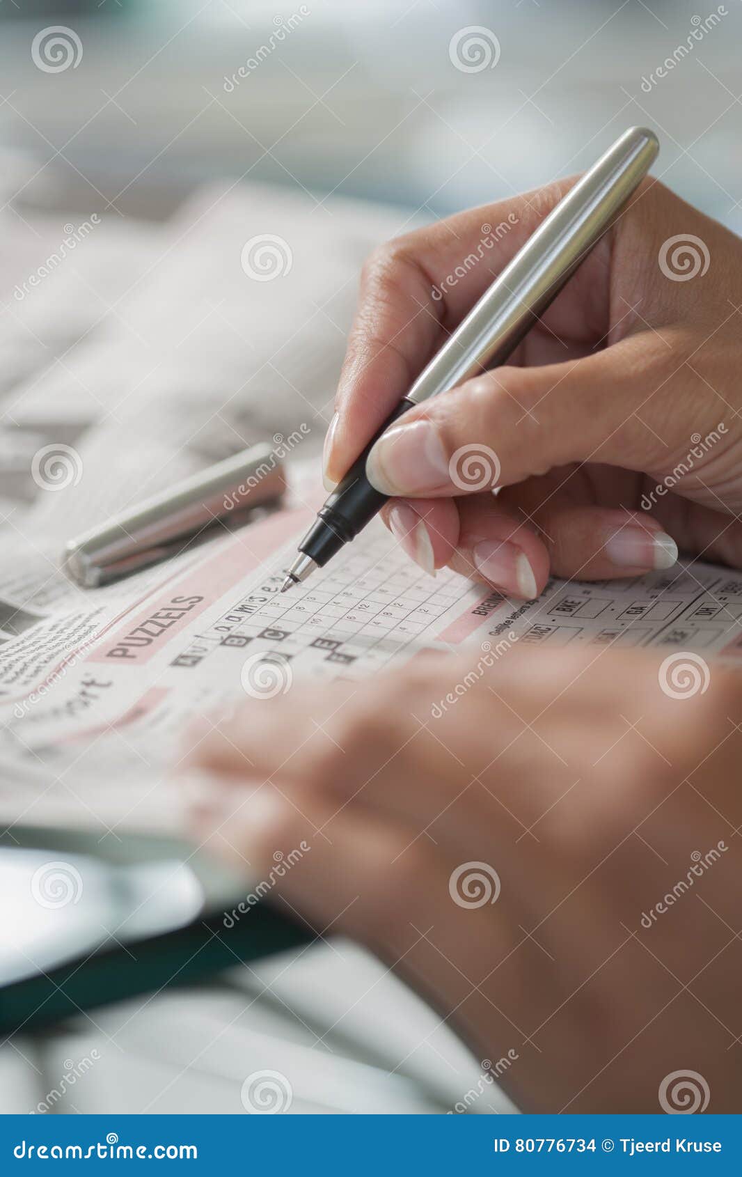 Solving a Crossword Puzzle Close up Stock Photo Image of exercise