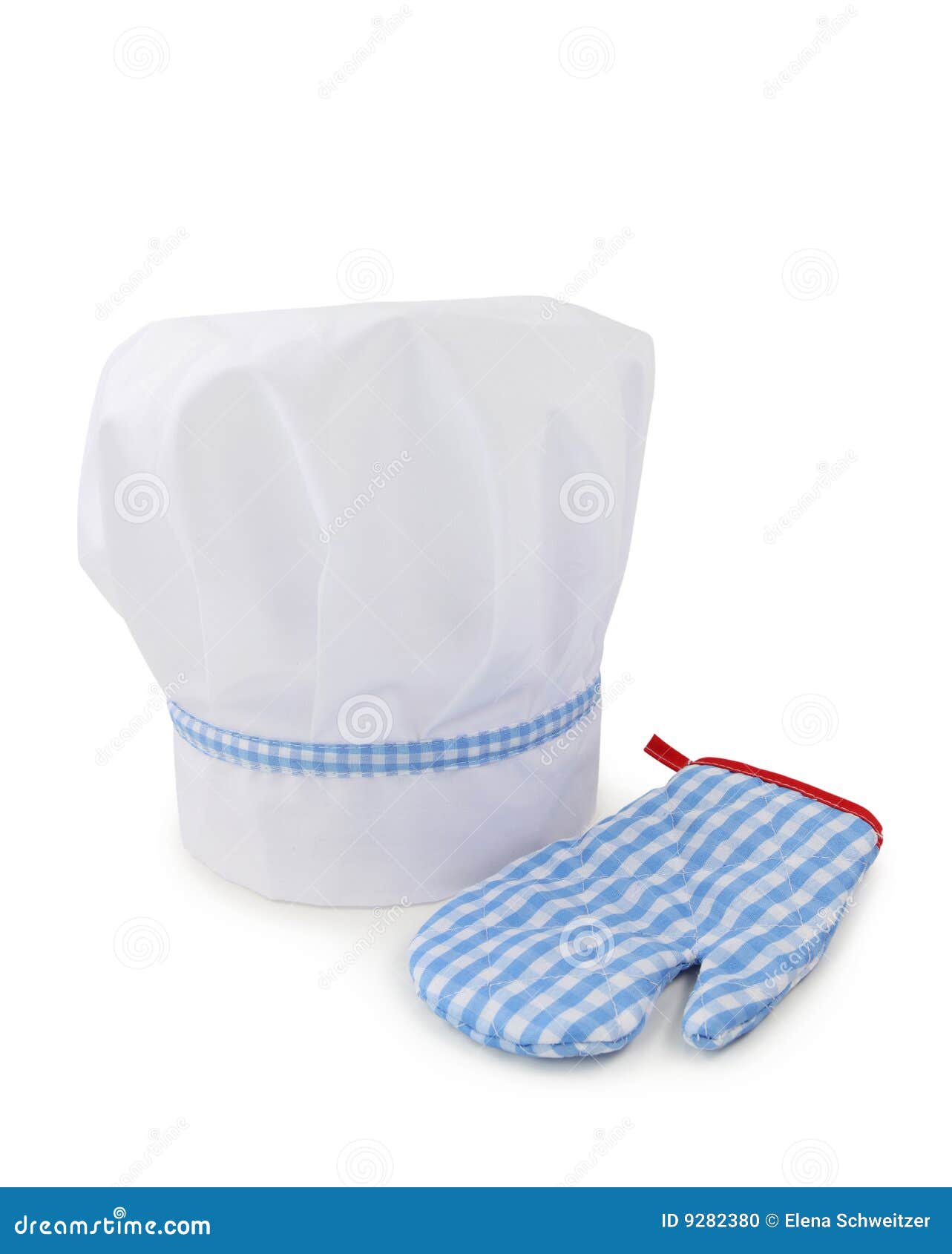 Sombrero y guantes del cocinero aislados en el fondo blanco