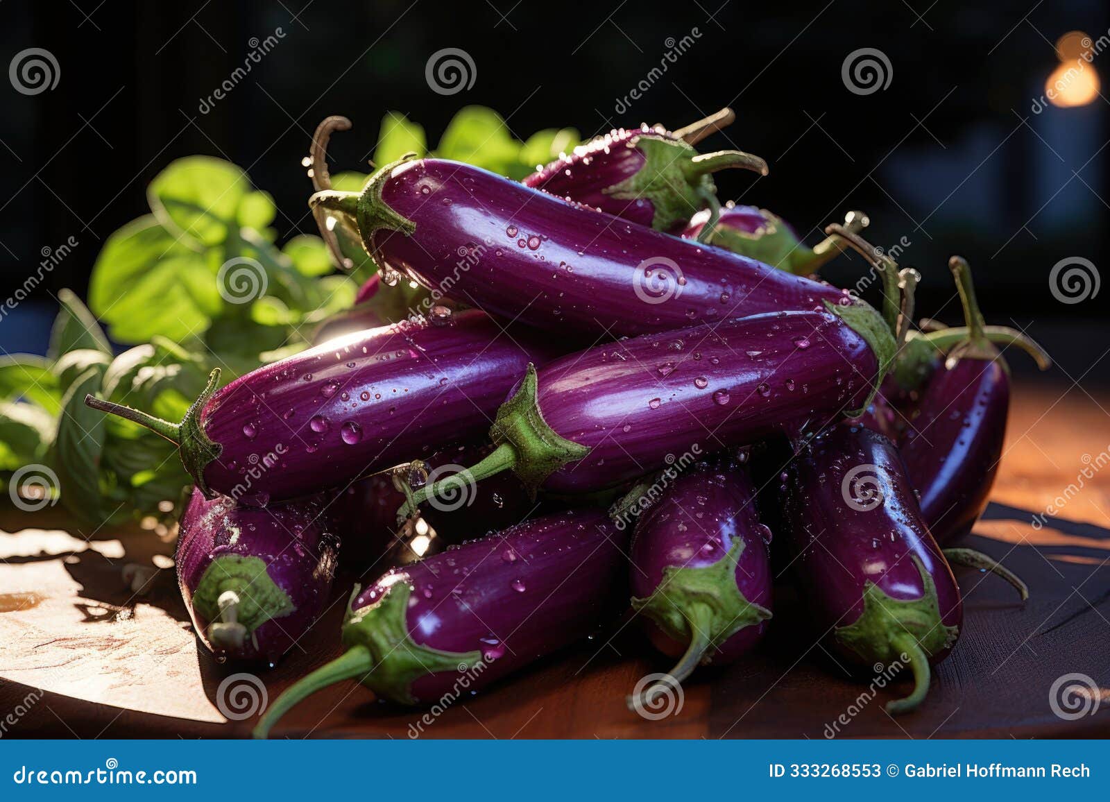 some eggplants on a wooden surface. fresh veget