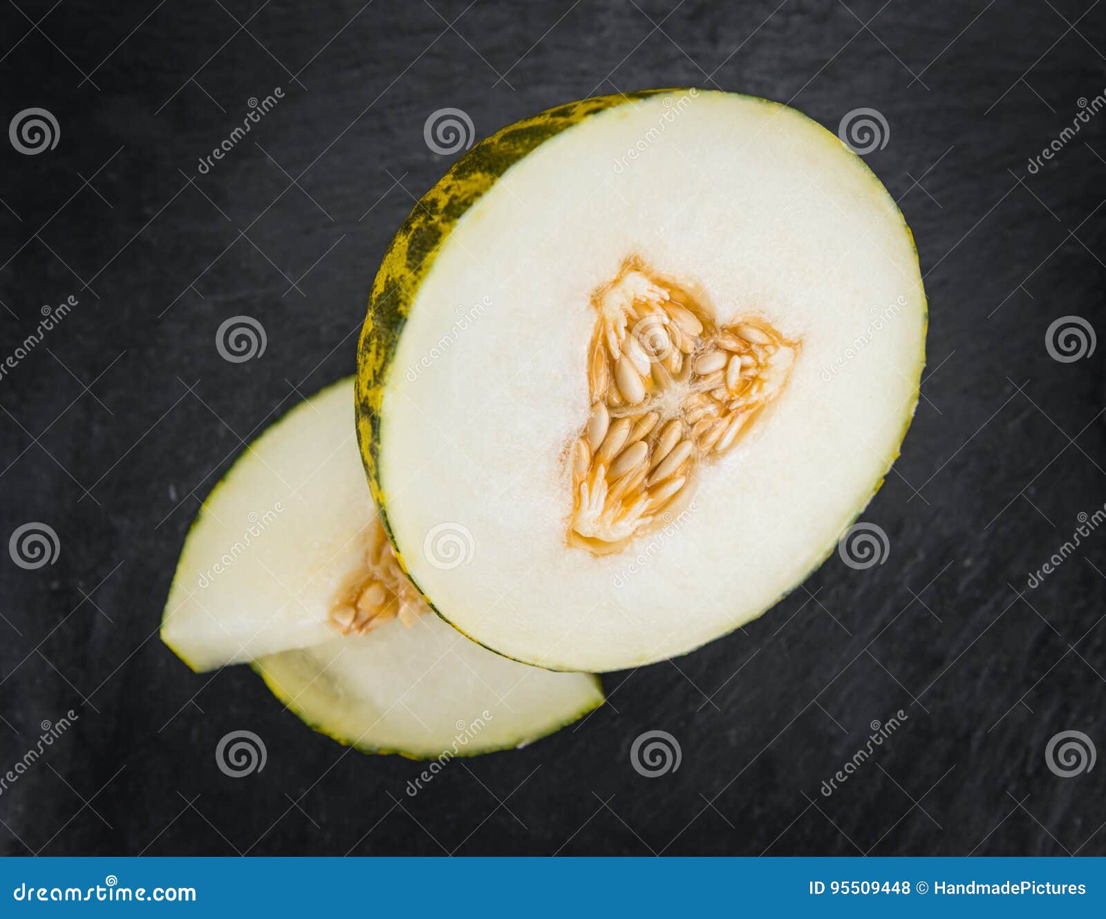 some futuro melons on a dark slate slab