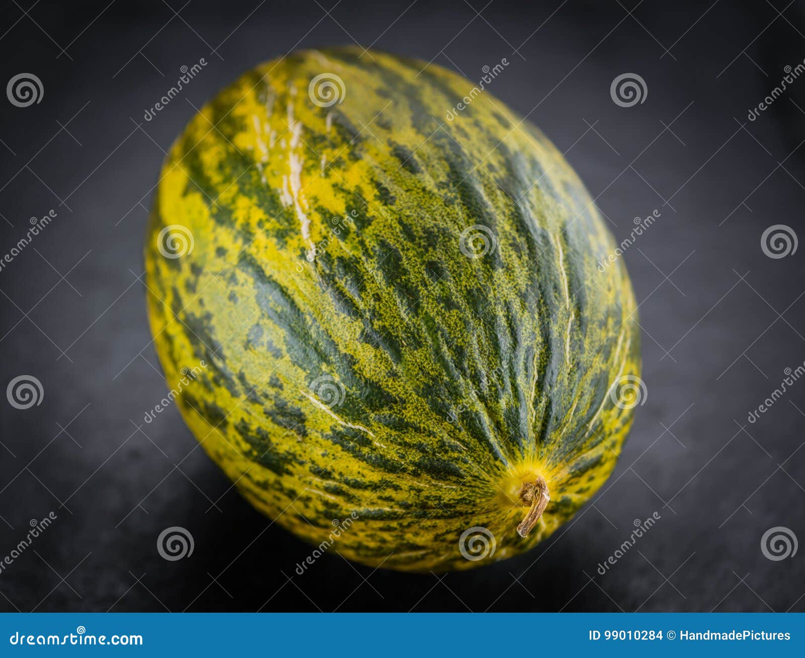 some futuro melons on a dark slate slab