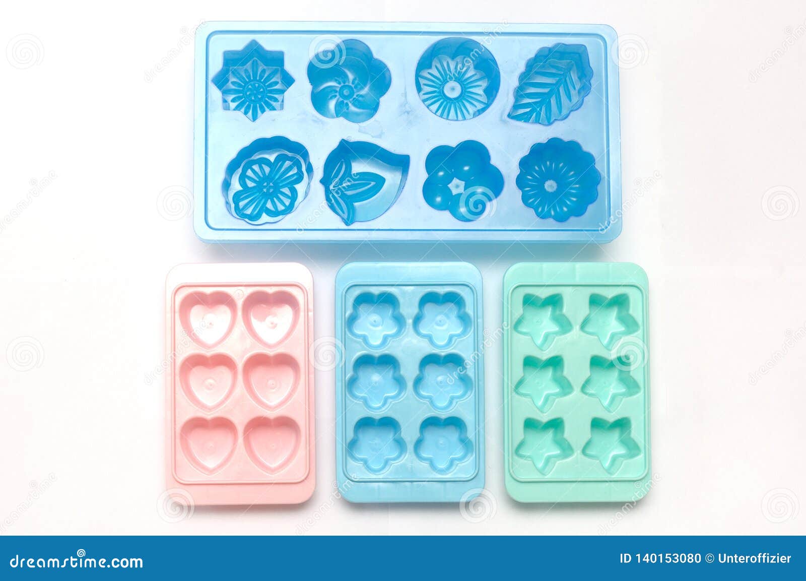 Some Plastic Ice Cube Mold Trays of Different Colors Stock Photo ...