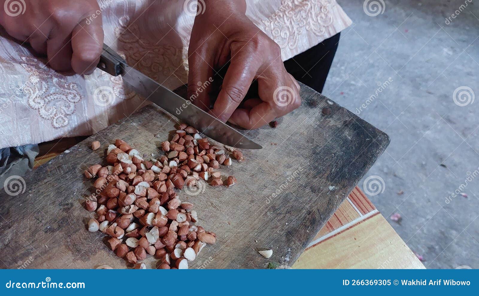 Someone Chops Peanuts To Cook into Peanut Brittle Stock Image Image