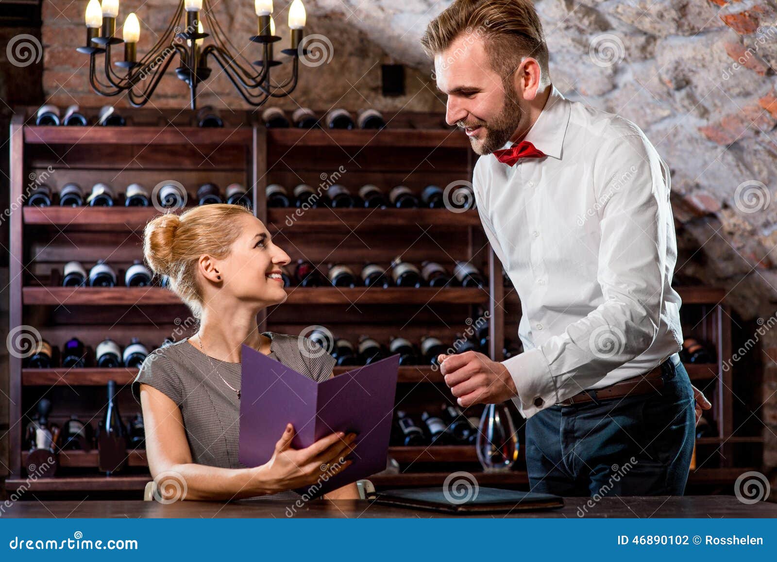 sommelier with young woman on degustation in the
