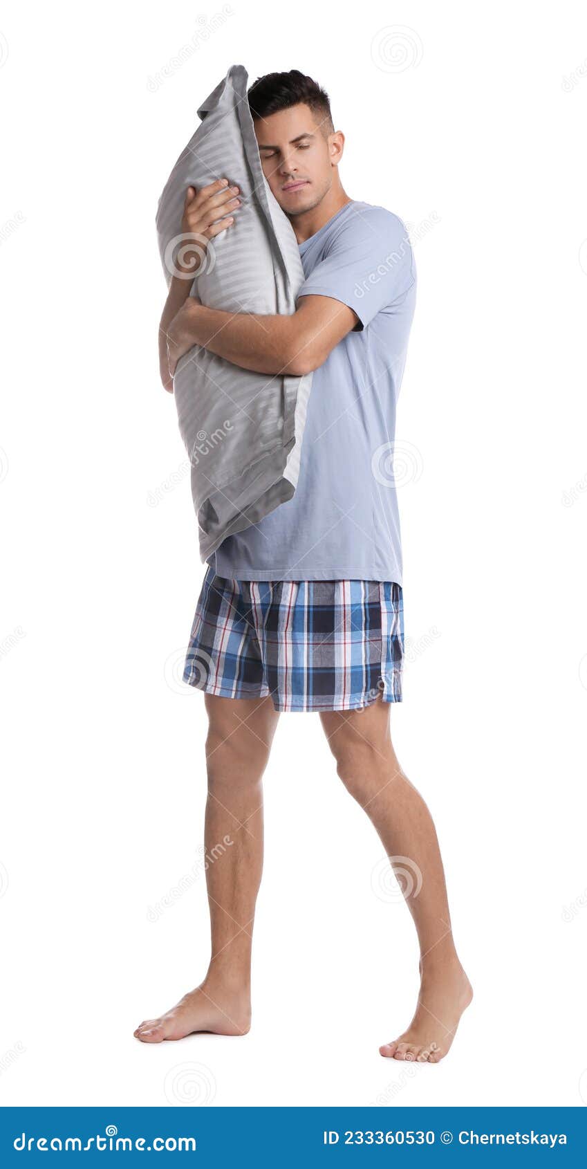 somnambulist with soft pillow on white background. sleepwalking
