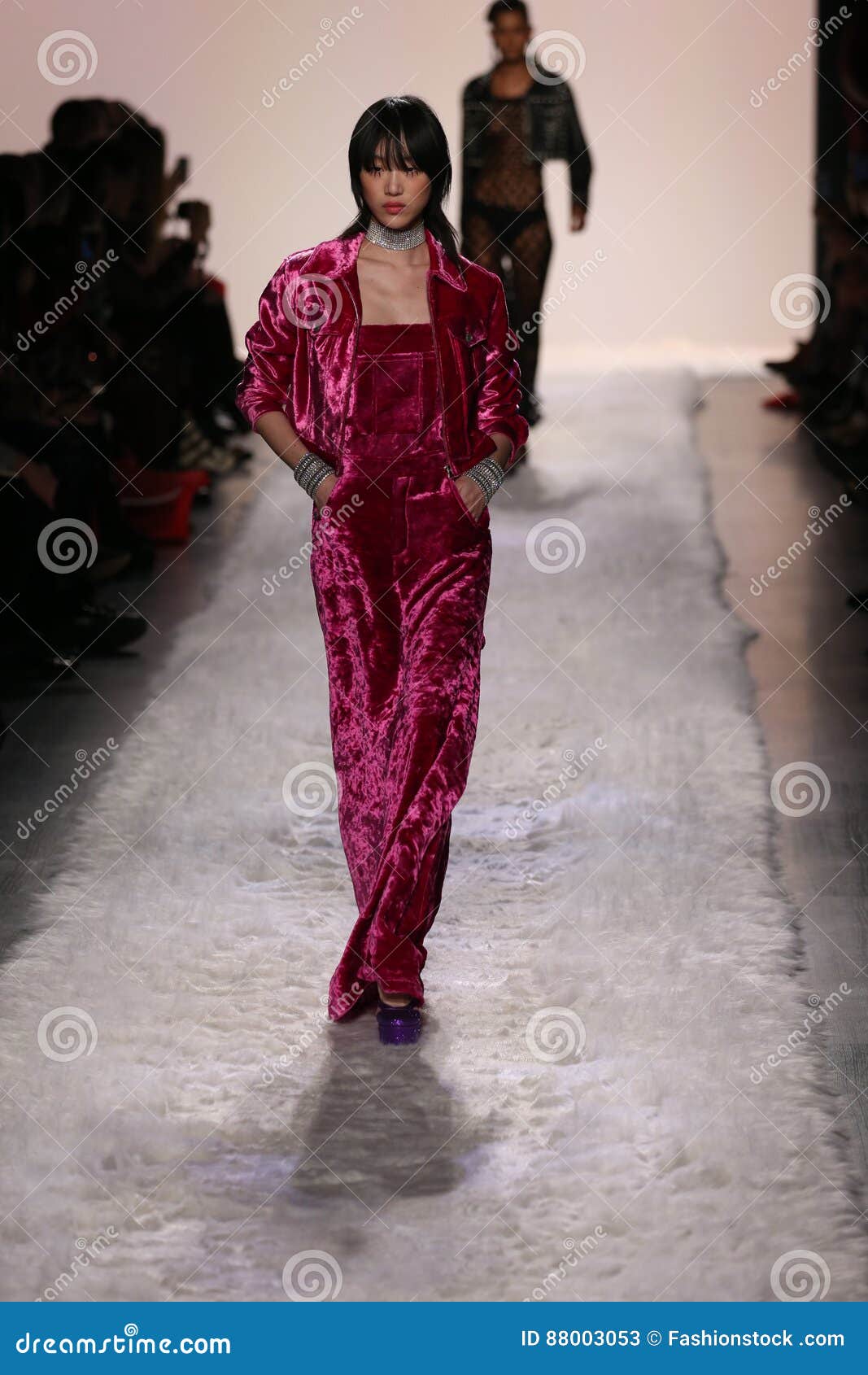 Sora Choi walking for Versace Fall Winter 2023. 