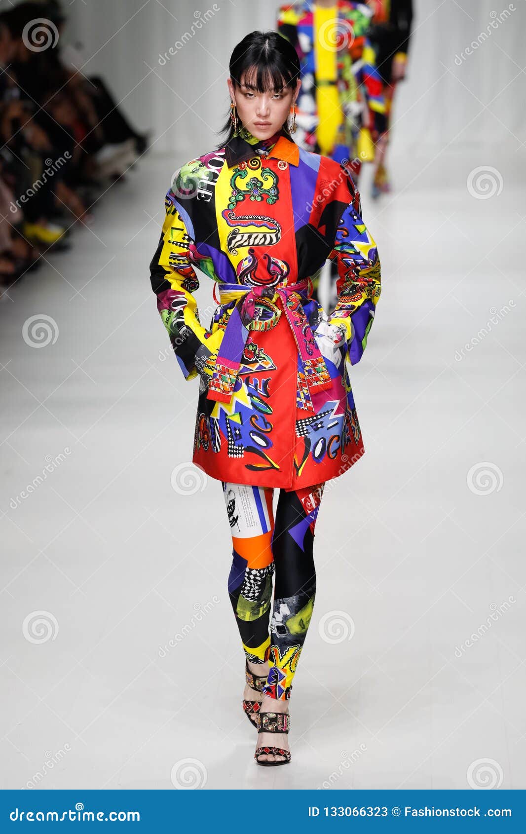 Sora Choi walking for Versace Fall Winter 2023. 