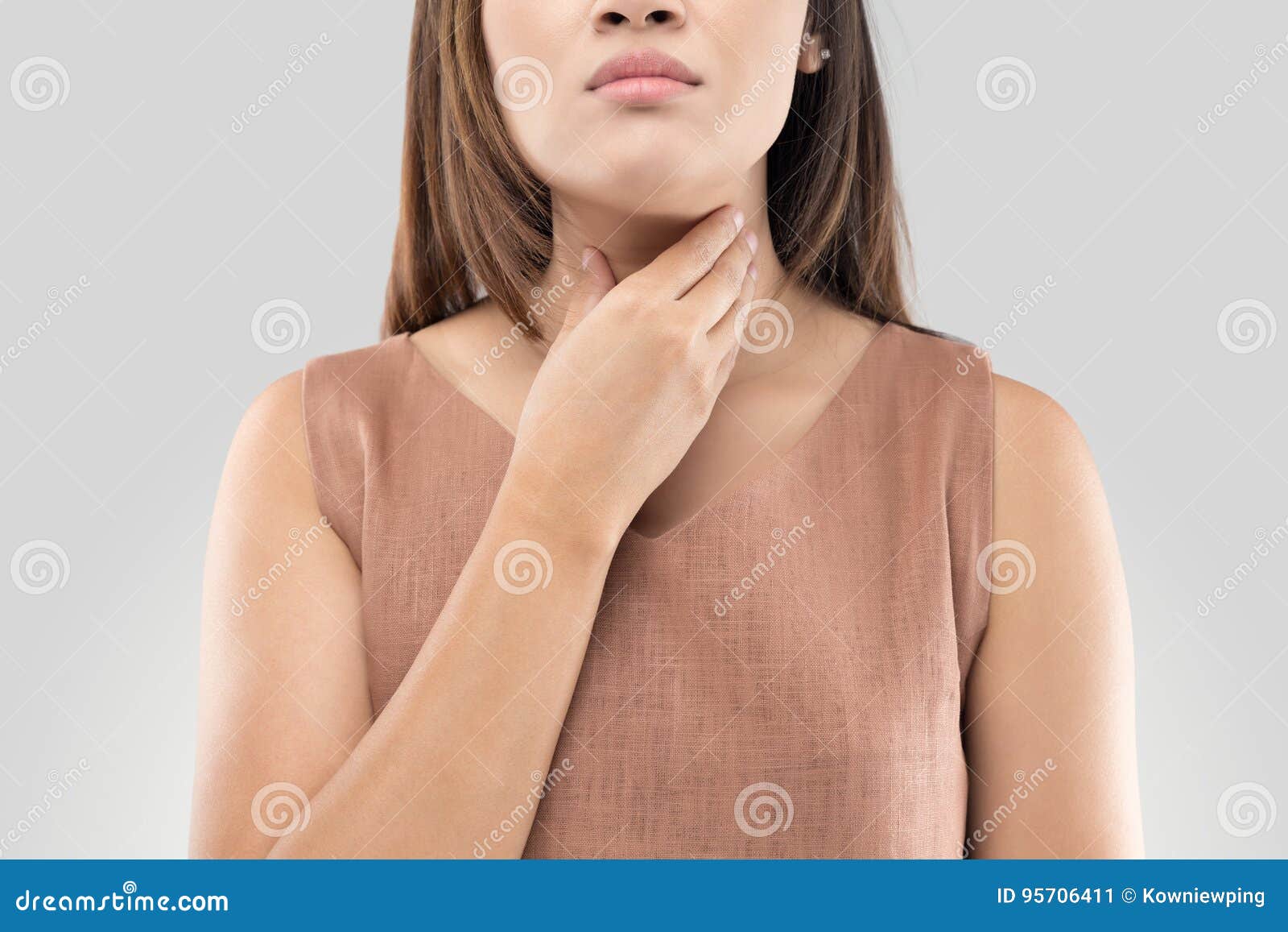 sore throat woman on gray background