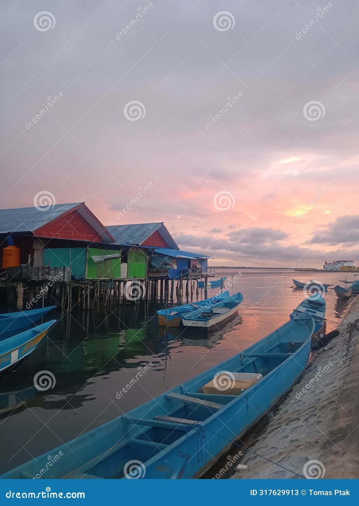 sorong harbour during sunset - entrypoint to raja ampat archipelago, west papua