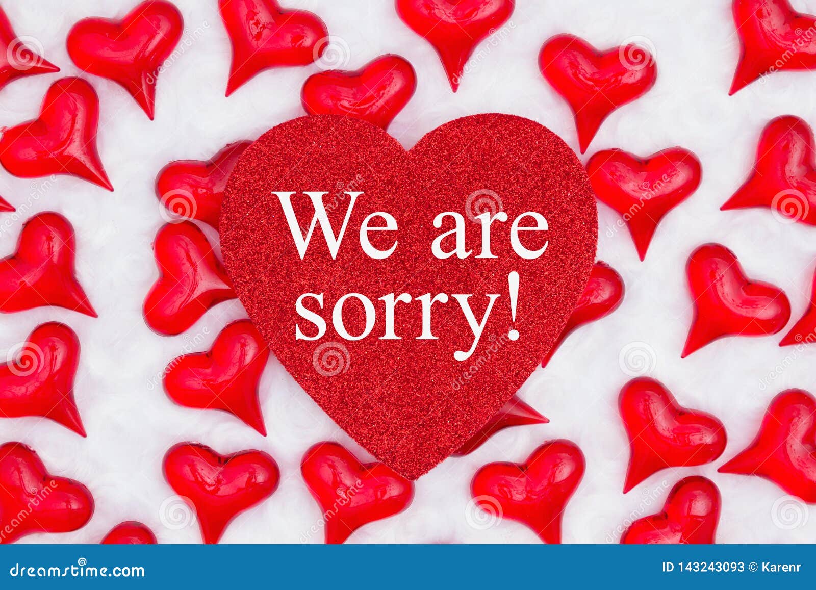 We are Sorry Message on Glitter Heart with Red Hearts on White ...