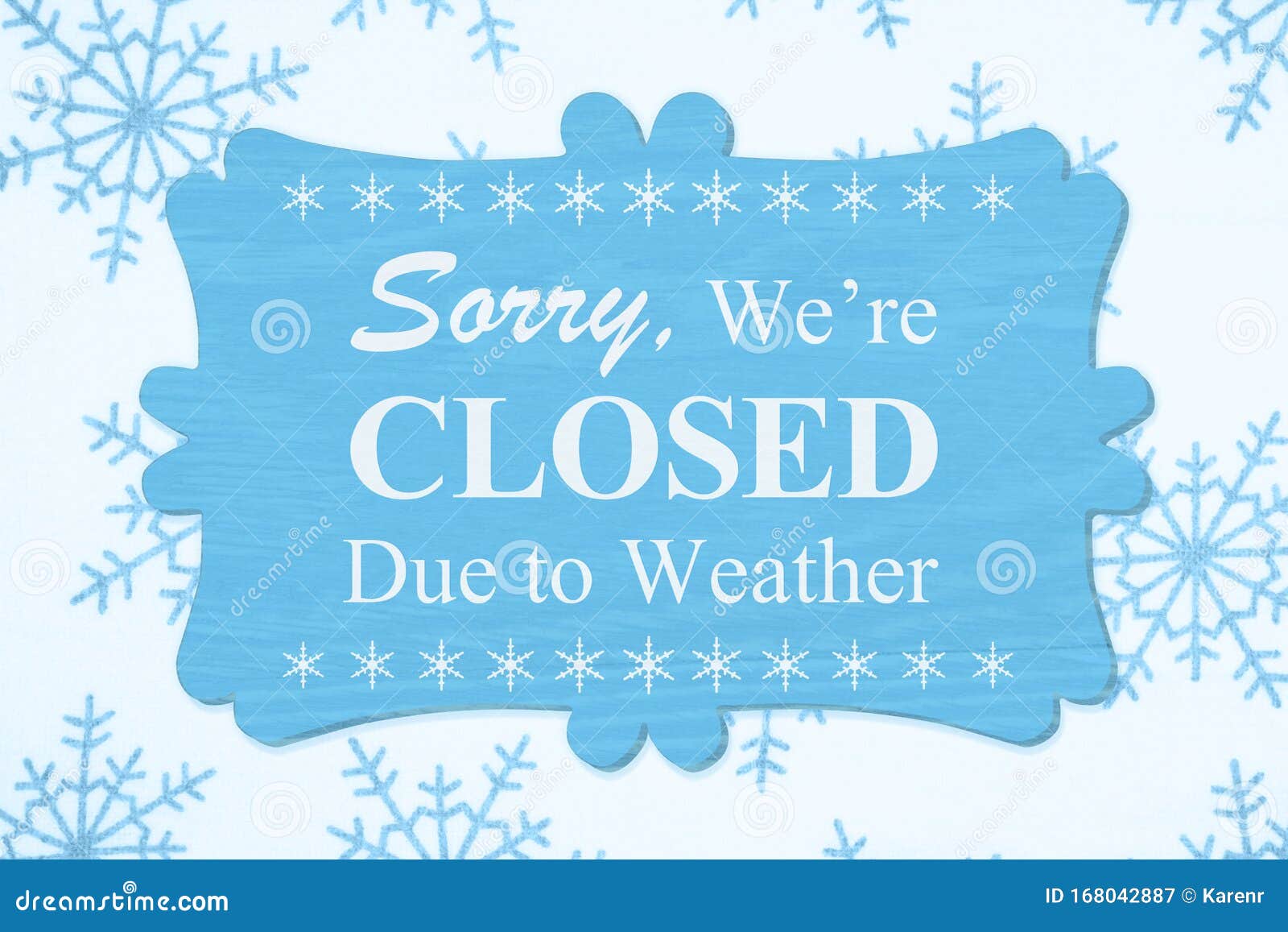 sorry we`re closed due to weather message on a wood sign