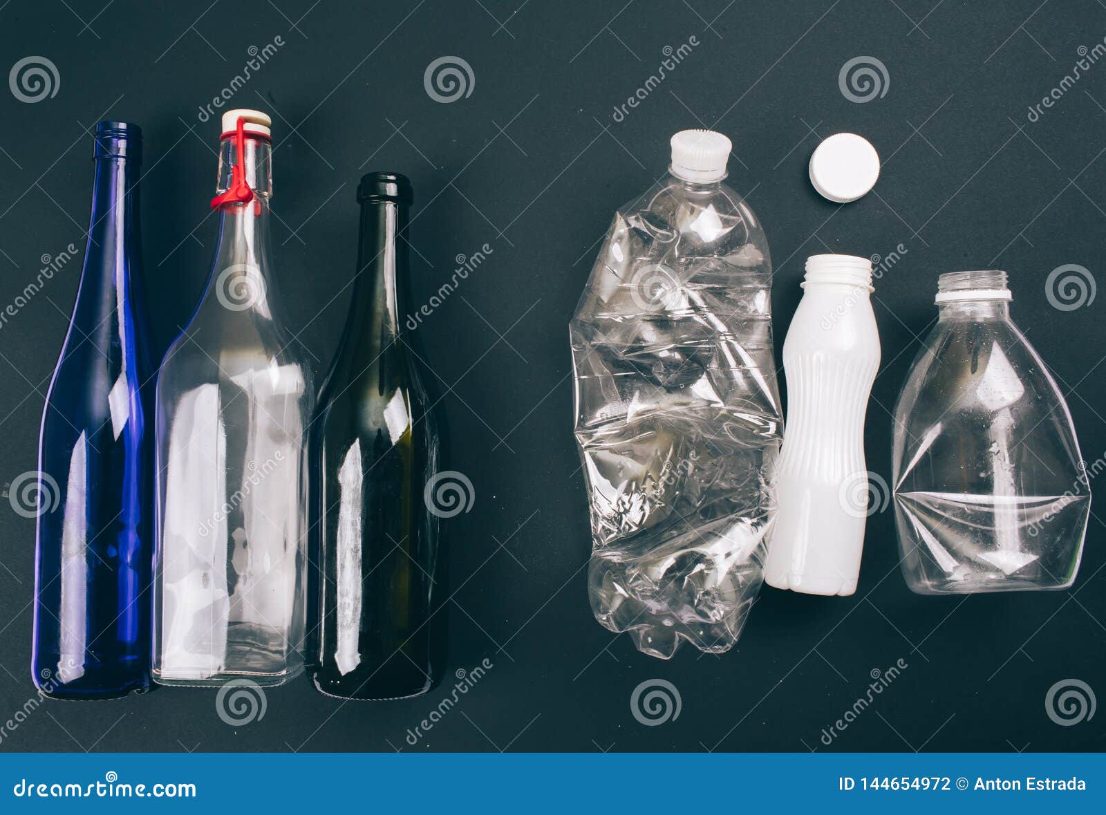 Sorting Waste. Three Empty Glass and Plastic Bottles are Prepared for