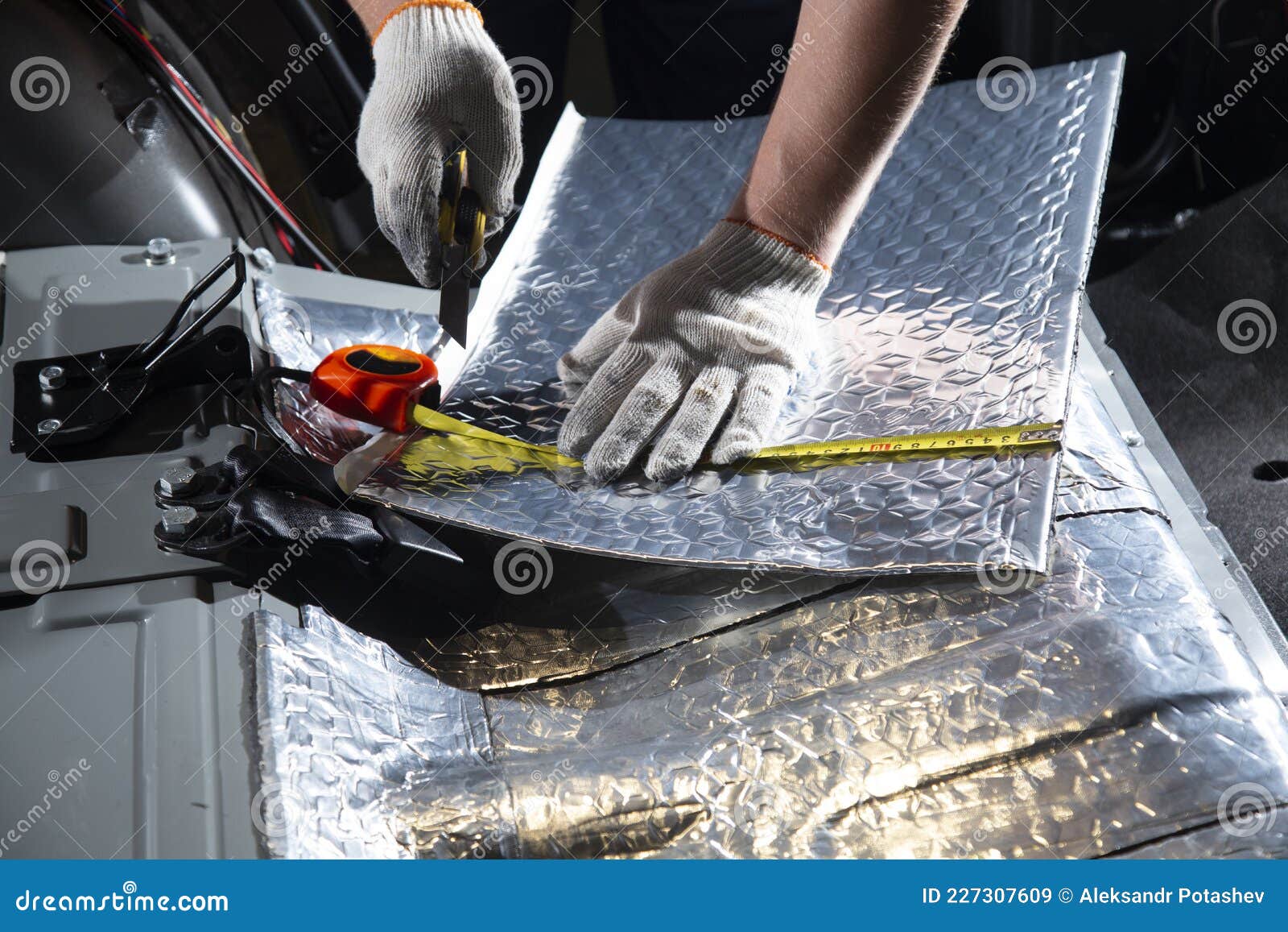 Sound Insulation of the Car. Installation of Sound Insulation Material on the Car Stock Image