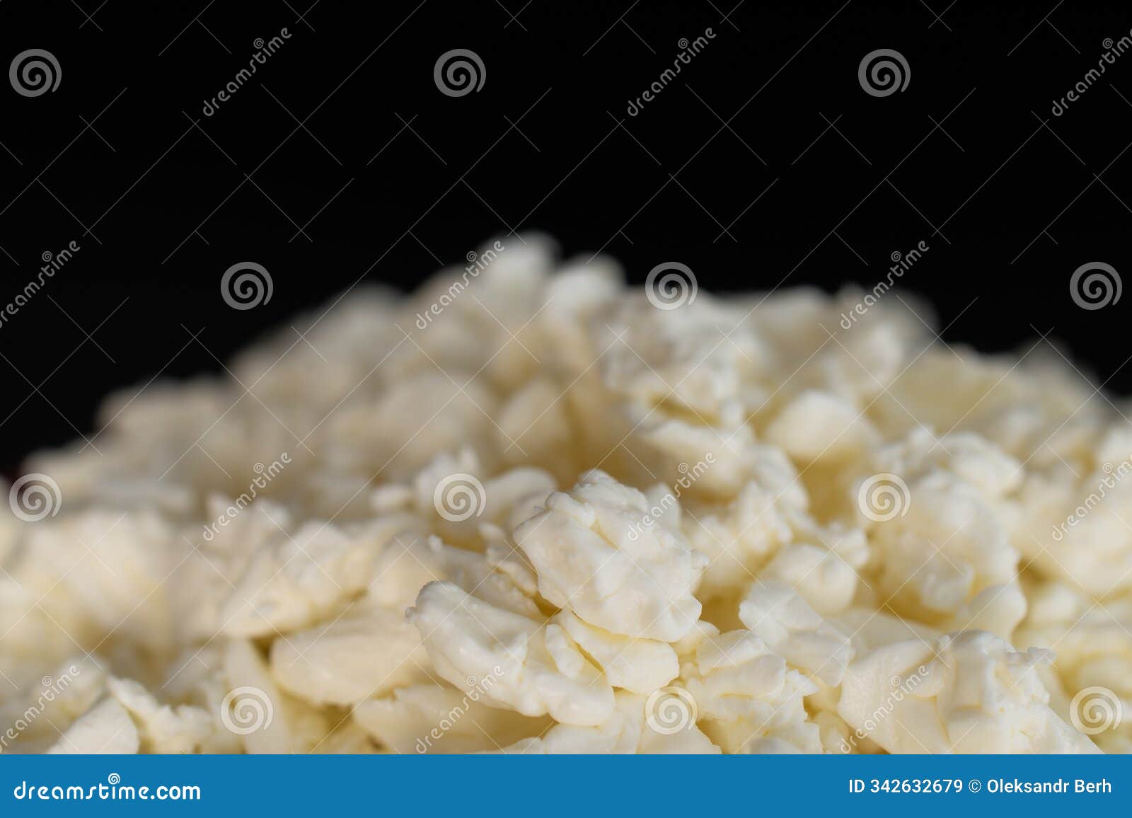 sour milk cheese with ceramic dish, macro,  on white background and top view.