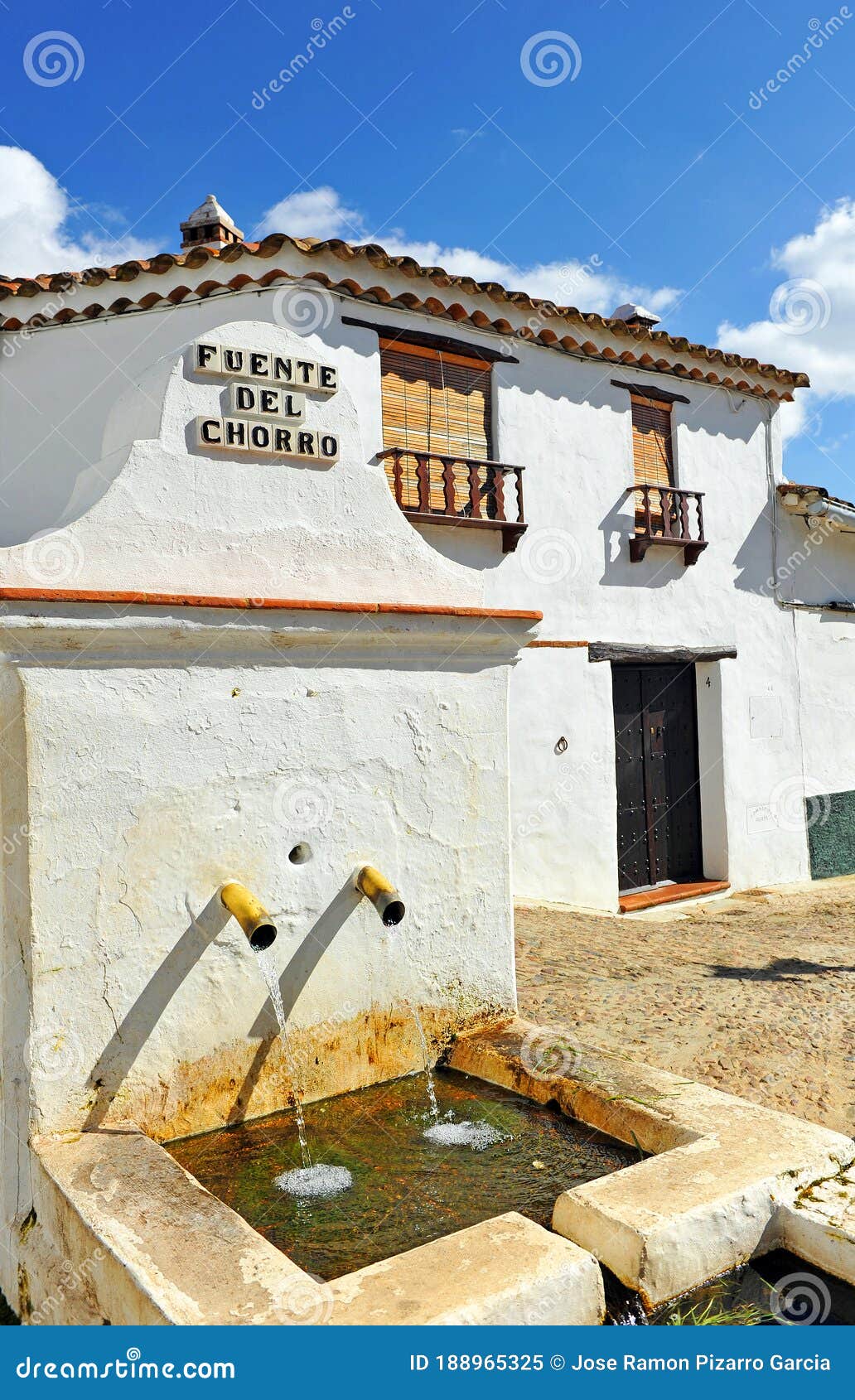 source of the jet -fuente del chorro- drinking water in castano del robledo, province of huelva, spain