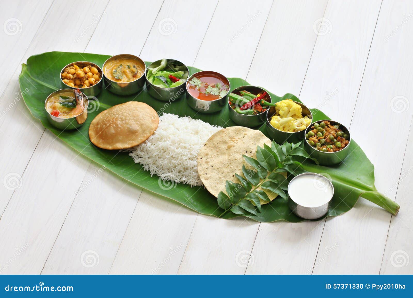 south indian meals served on banana leaf