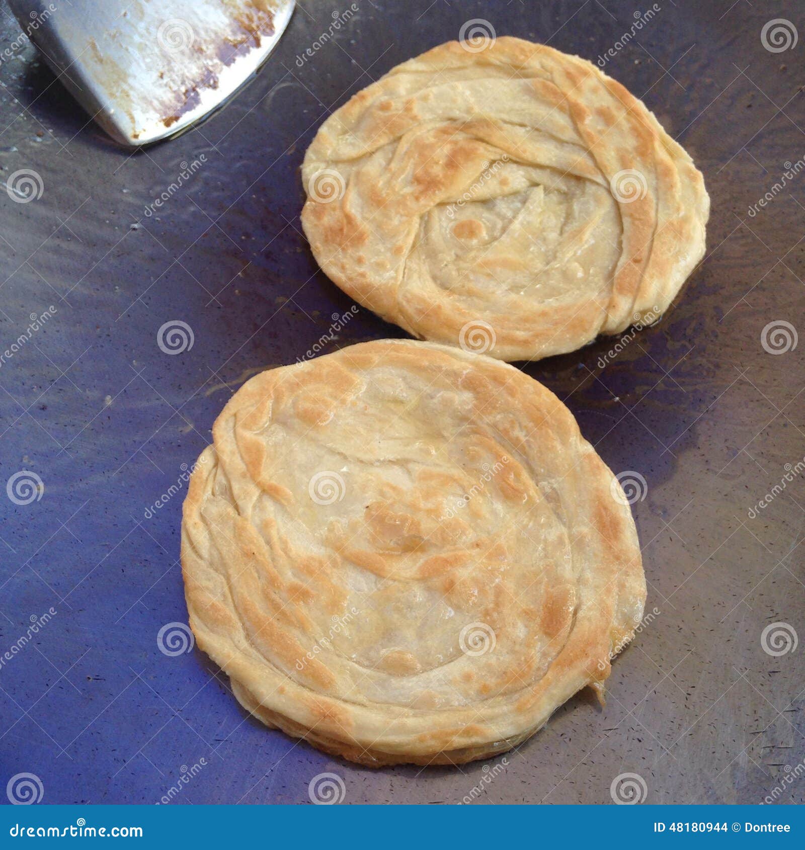 Southern flat bread frying stock photo. Image of gourmet 48180944