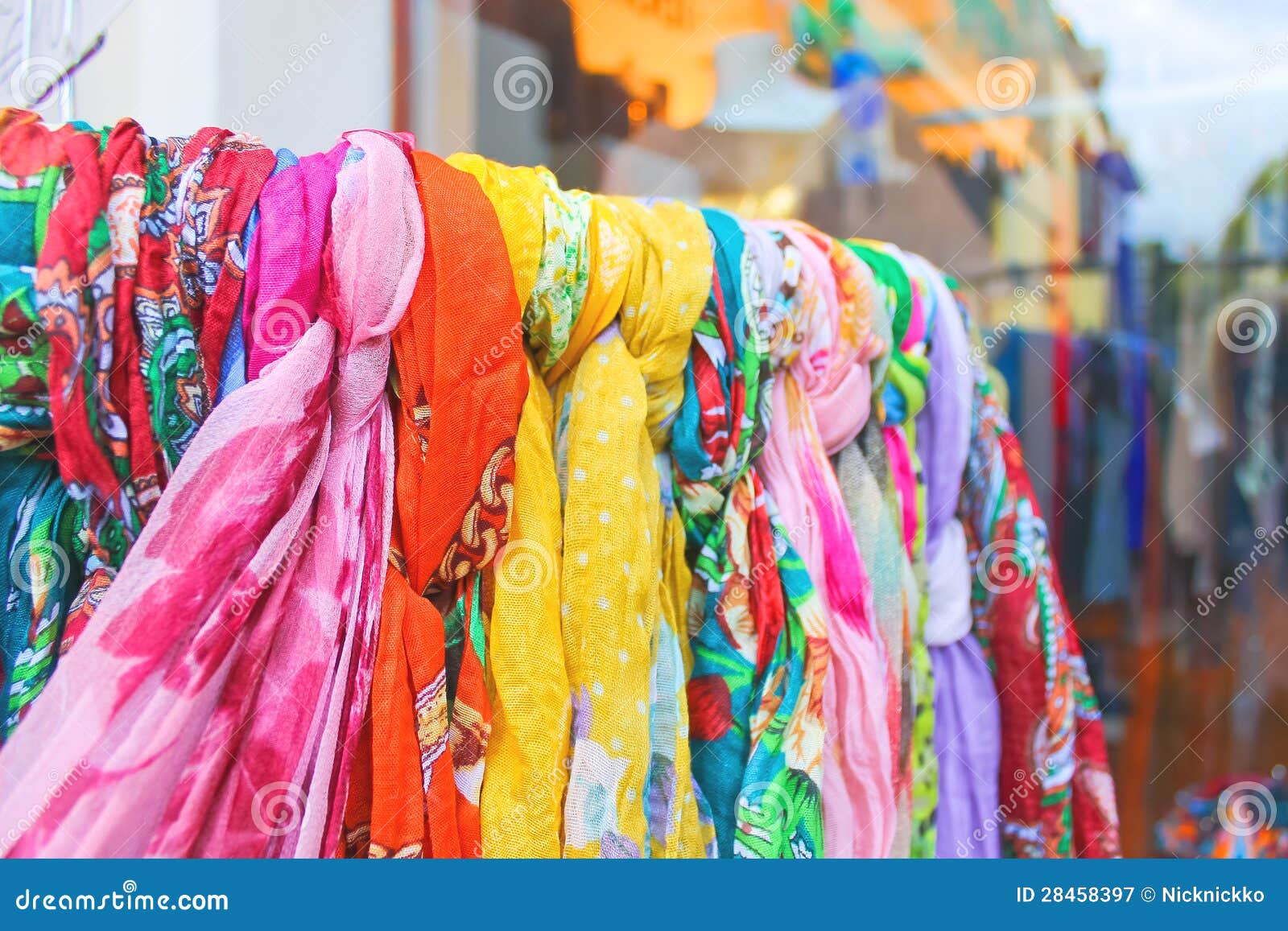 Souvenir scarves on a rack stock image. Image of industry 28458397