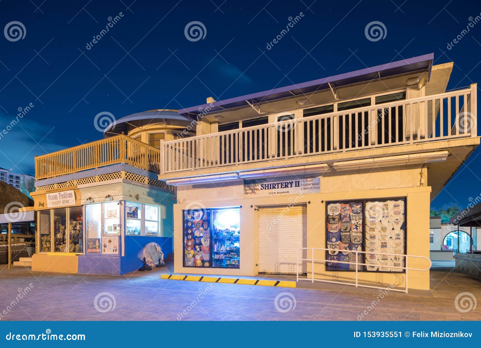 Souvenir Shops on Hollywood Beach Boardwalk at Night Editorial Photo