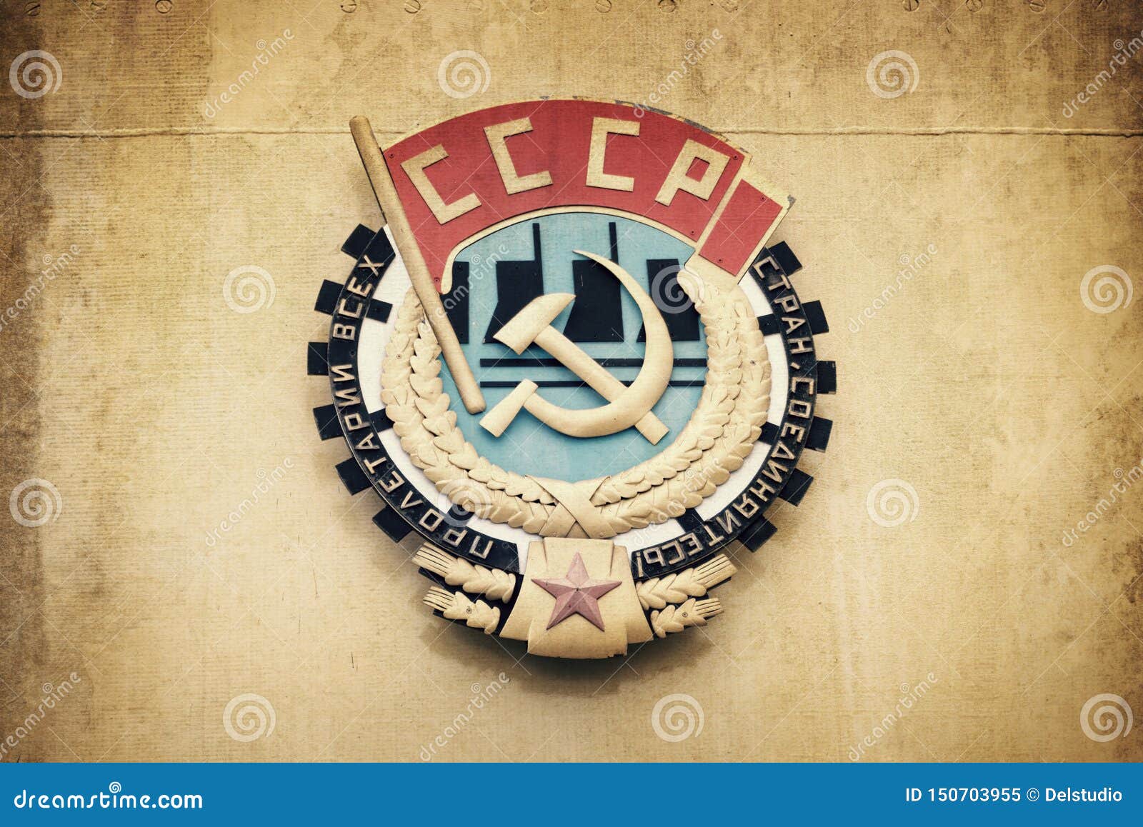 soviet union cccp emblem with hammer and sickle on a wall