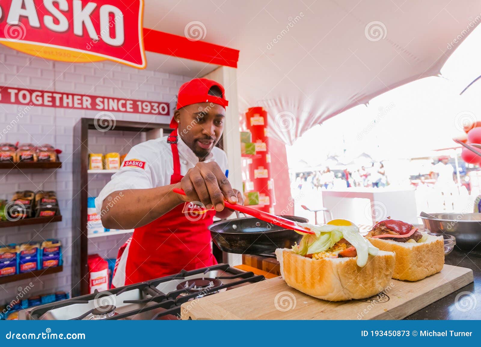 Professional Chefs Cooking And Preparing Street Food Called Bunny Chow At Food Festival ...