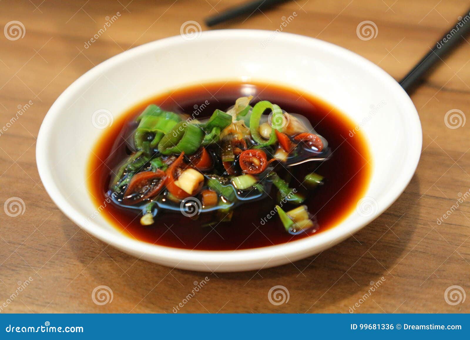 soy sauce with spring onion.