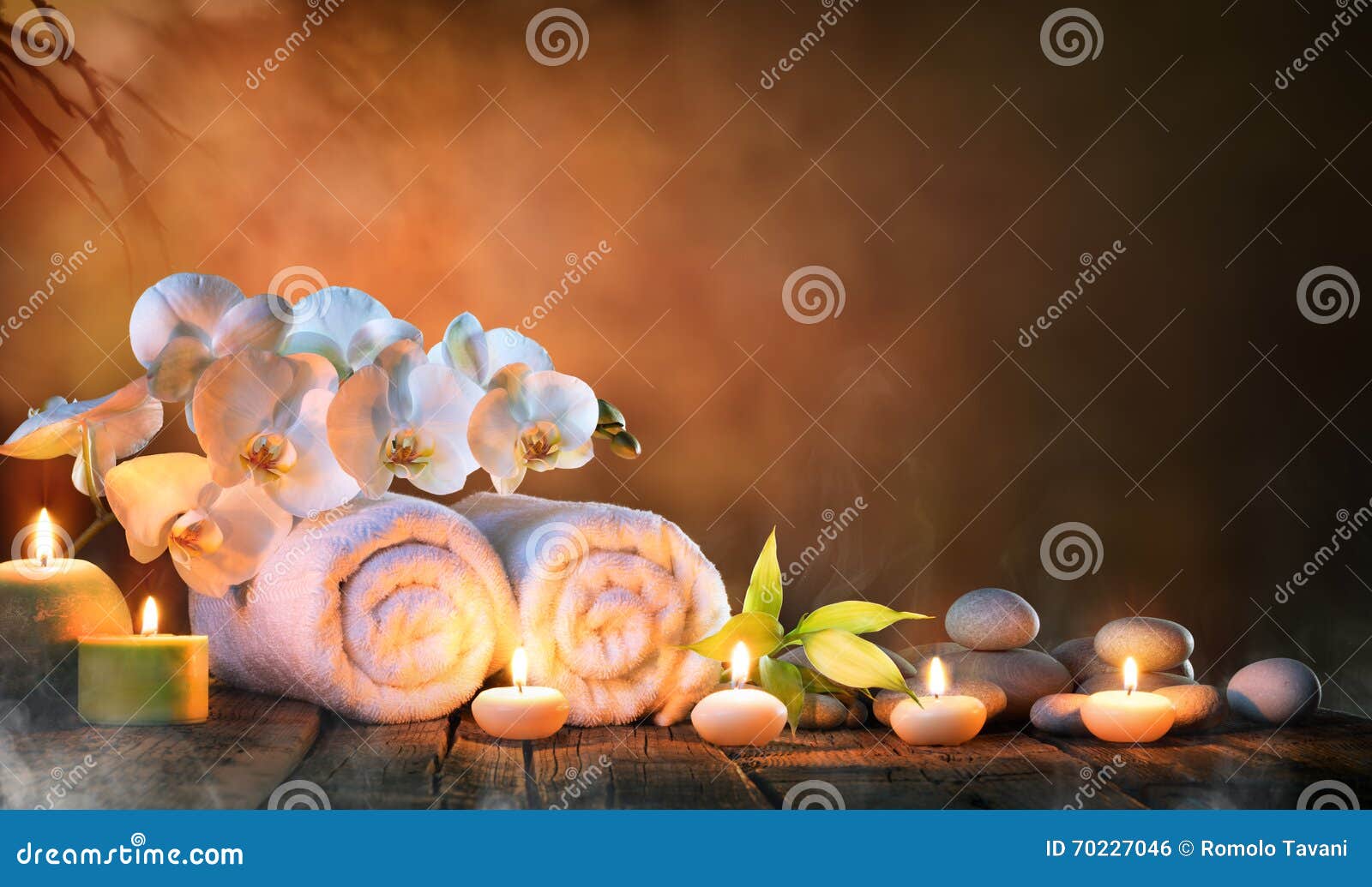 spa - couple towels with candles and orchid