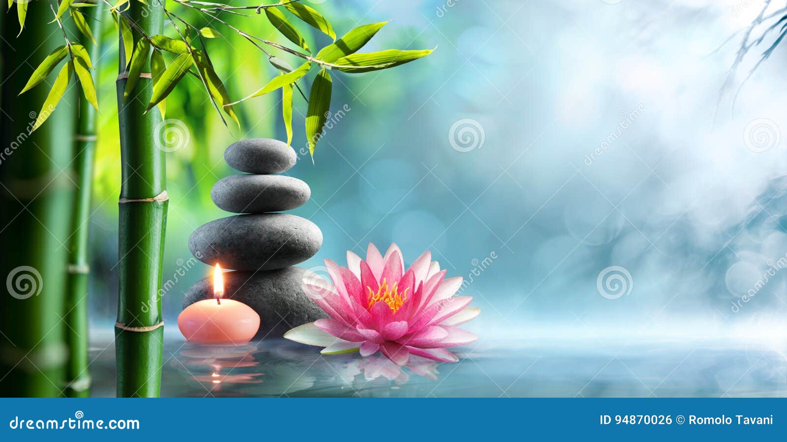 spa - natural alternative therapy with massage stones and waterlily