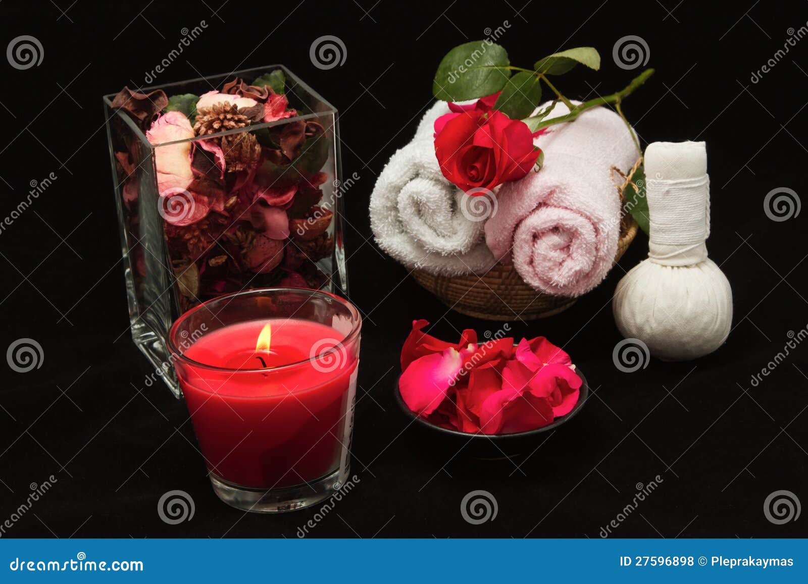 Spa Red Rose Setting with Thai Herbal Compress Stamps Stock Photo
