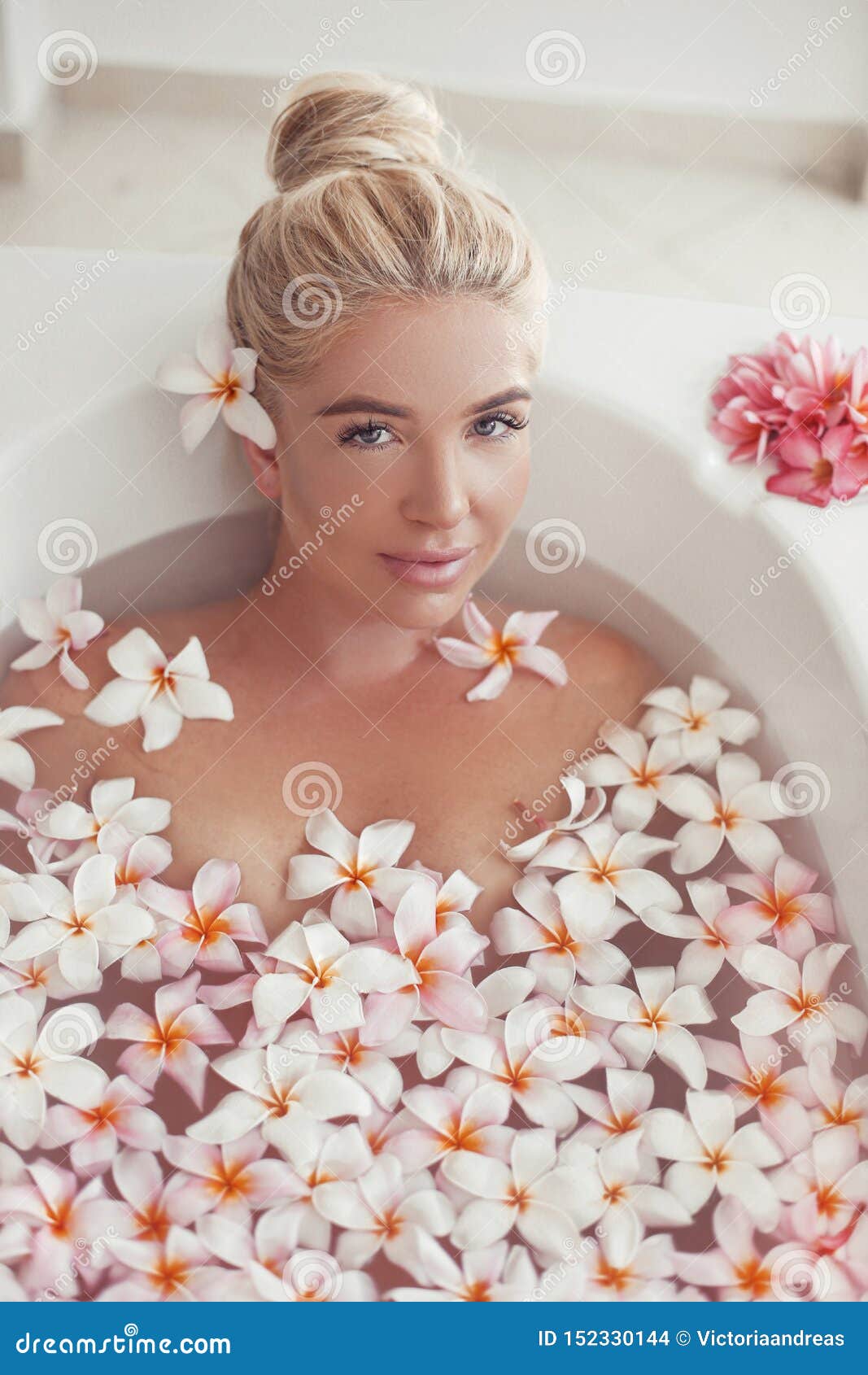 Spa Relax Blonde Enjoying Bath With Plumeria Tropical Flowers Health