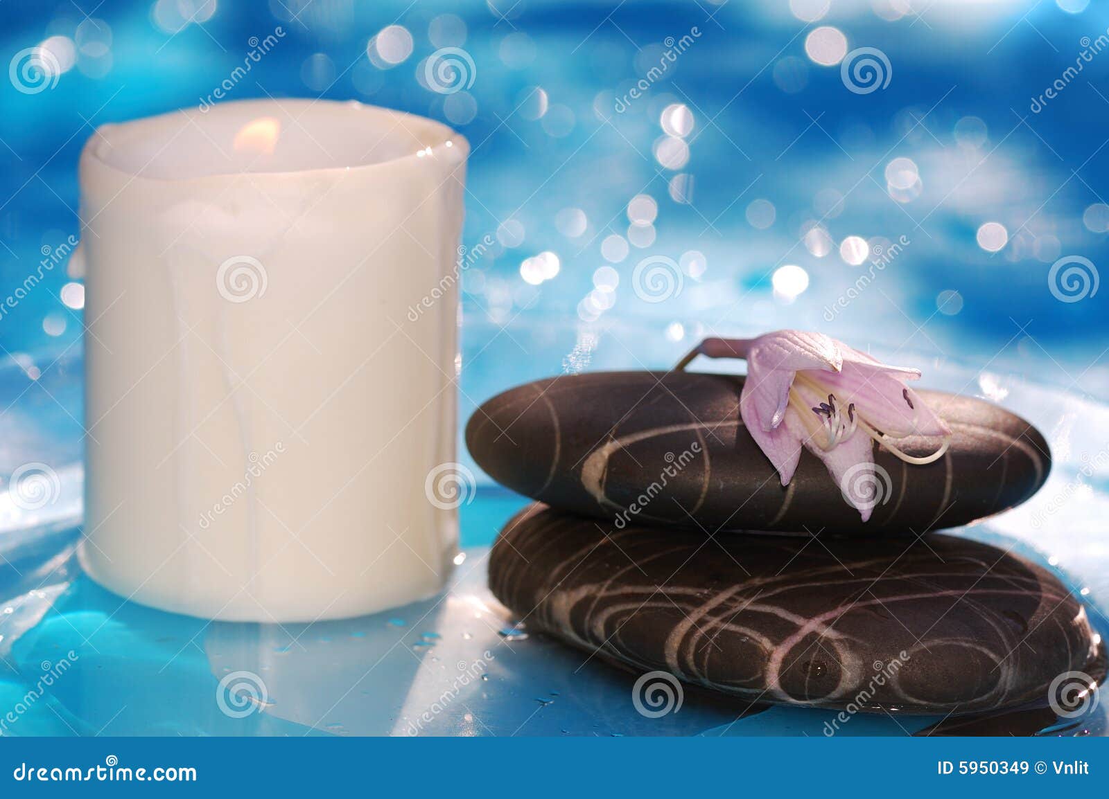 Spa stones with candle stock image. Image of clean, alternative 5950349