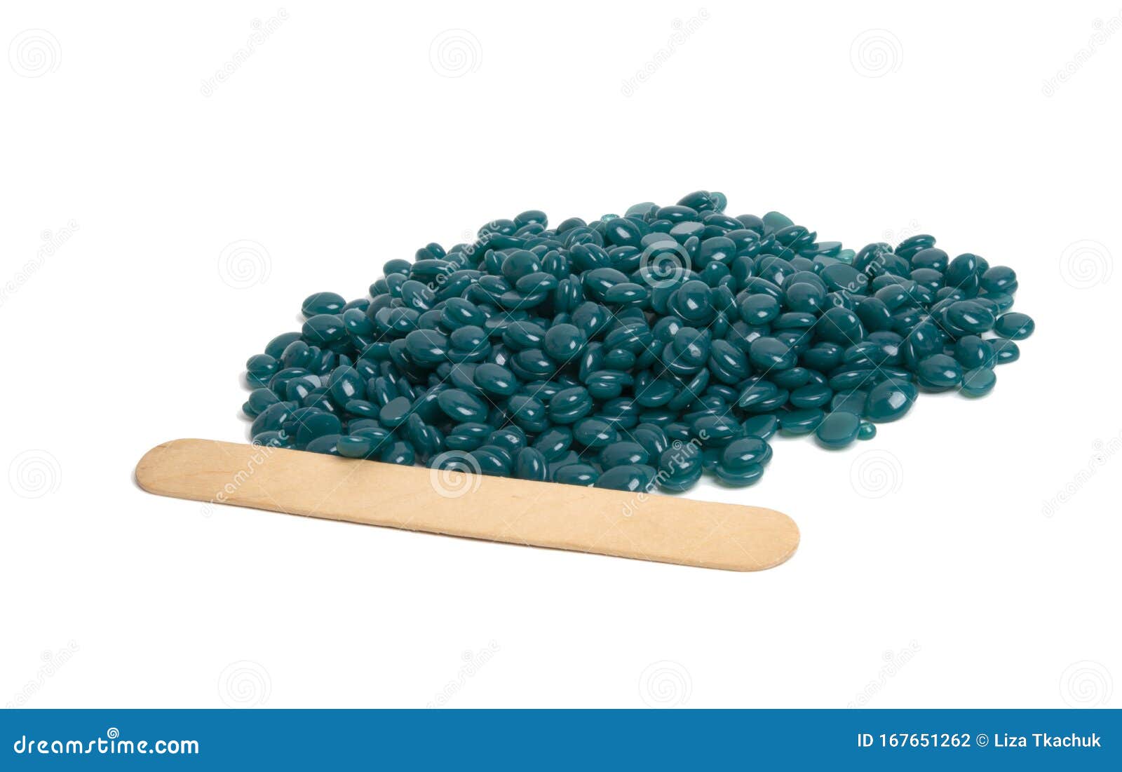 spa wax for depilation in granular form on the white background