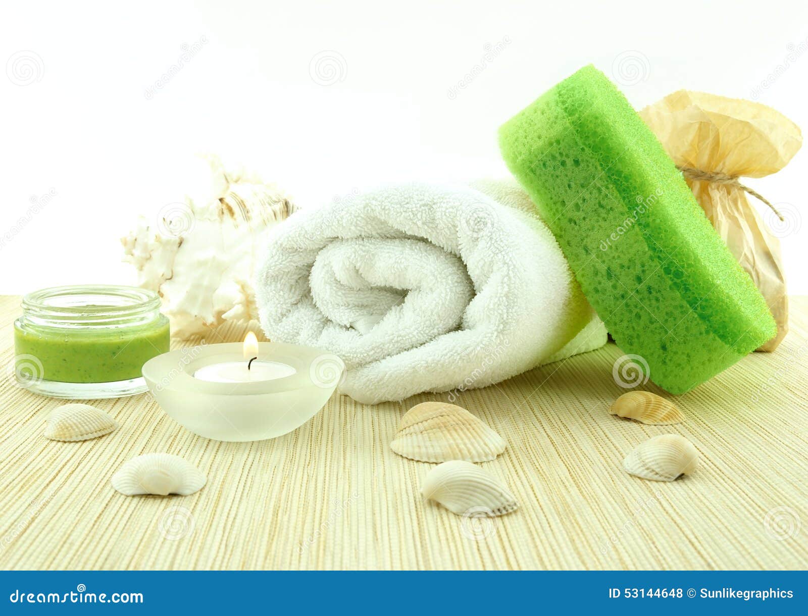 Spa and Wellness Setting with Towel, Sponge, Creme and Candles Stock