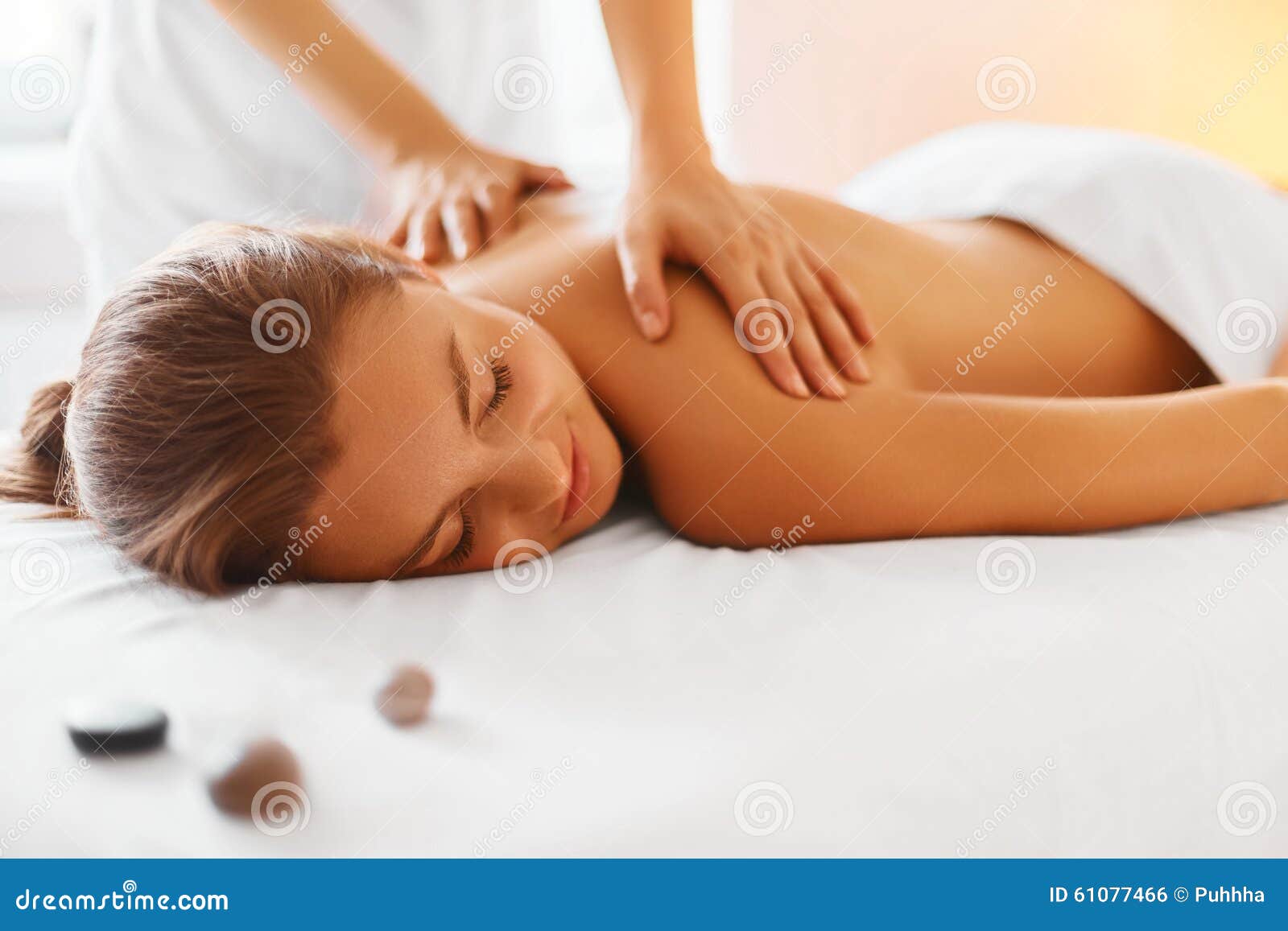 spa woman. female enjoying massage in spa centre.