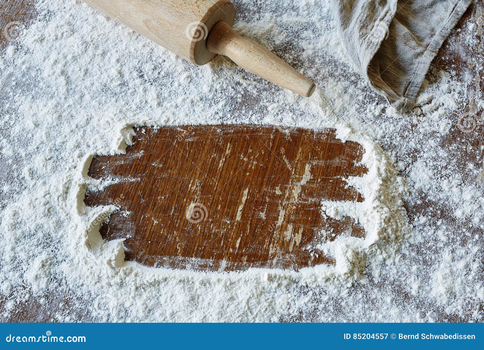 space wiped in flour in vivid kitchen scene