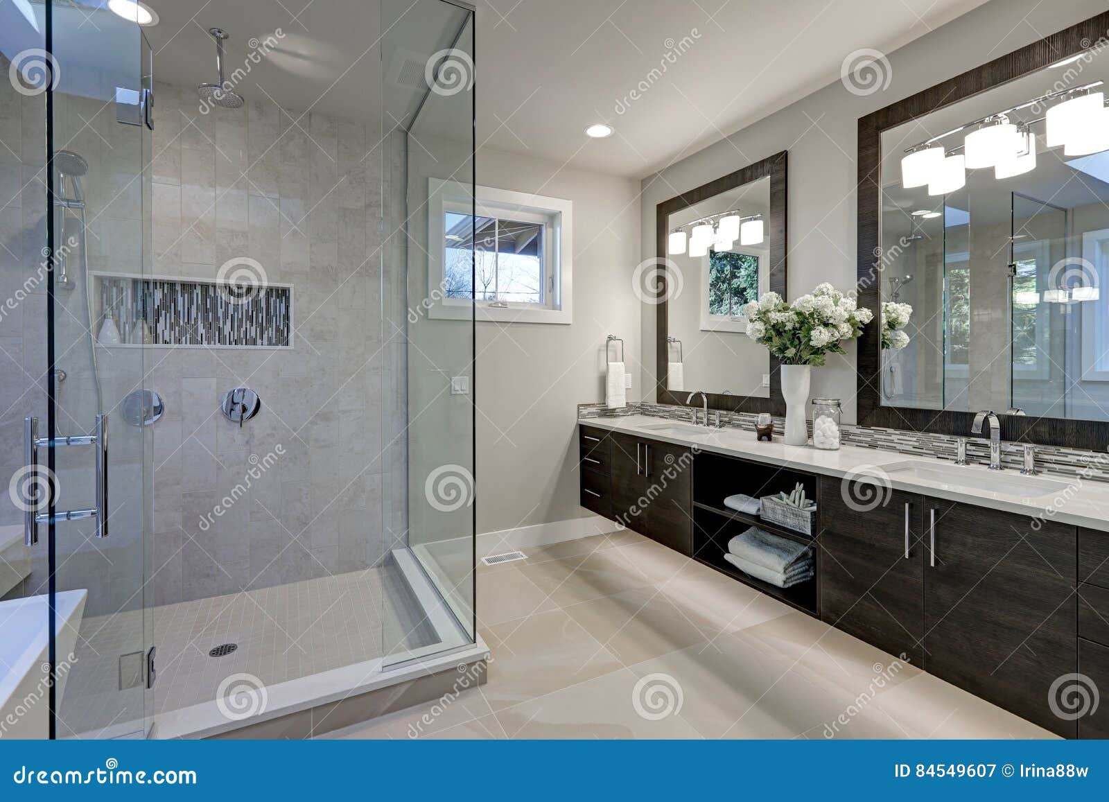 spacious bathroom in gray tones with heated floors