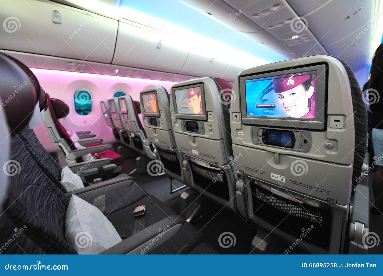Spacious And Comfortable Economy Class Cabin Of Qatar