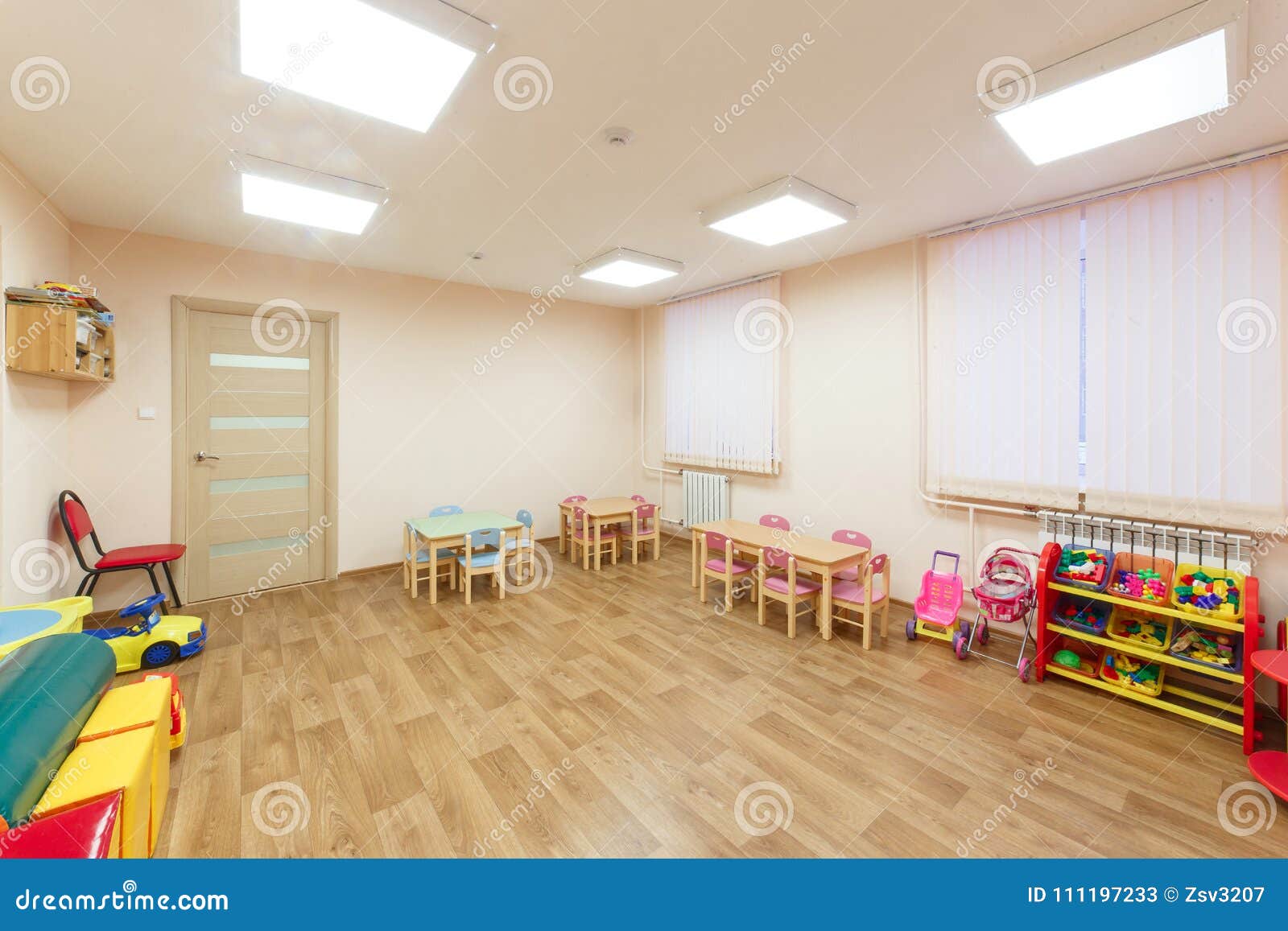 Spacious Light Pink Colored Game Room with in the Kindergarten Stock