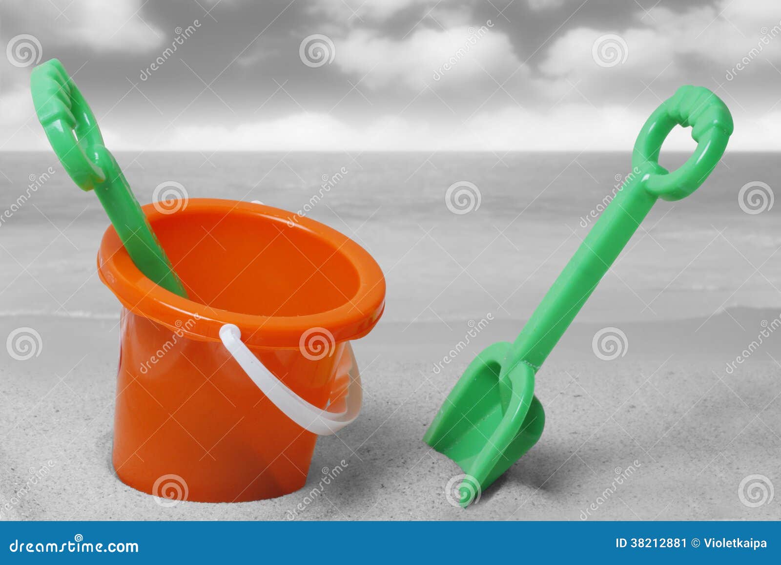 Spade and bucket on beach stock image. Image of color 38212881