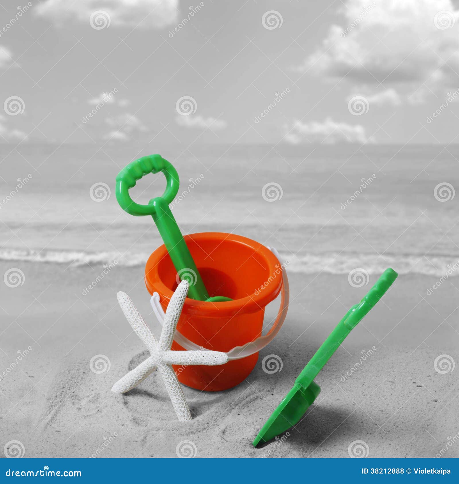 Spade and bucket on beach stock photo. Image of orange 38212888