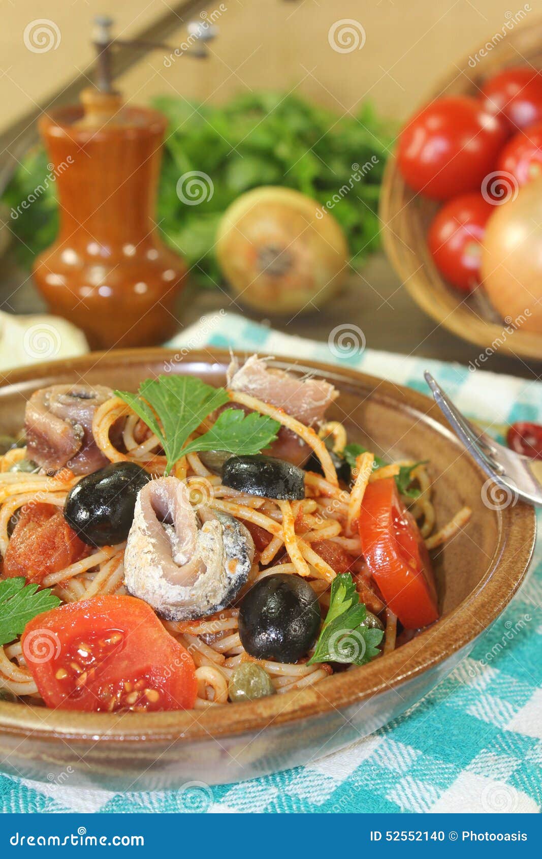 Spaghetti Alla Puttanesca with Anchovy and Tomatoes Stock Photo Image