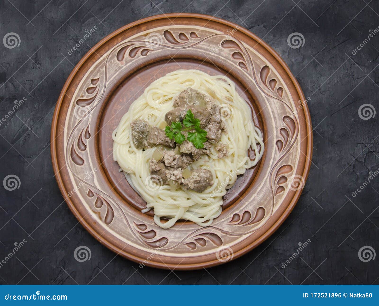 Spaghetti with Braised Beef Liver Top View Selective Stock Photo