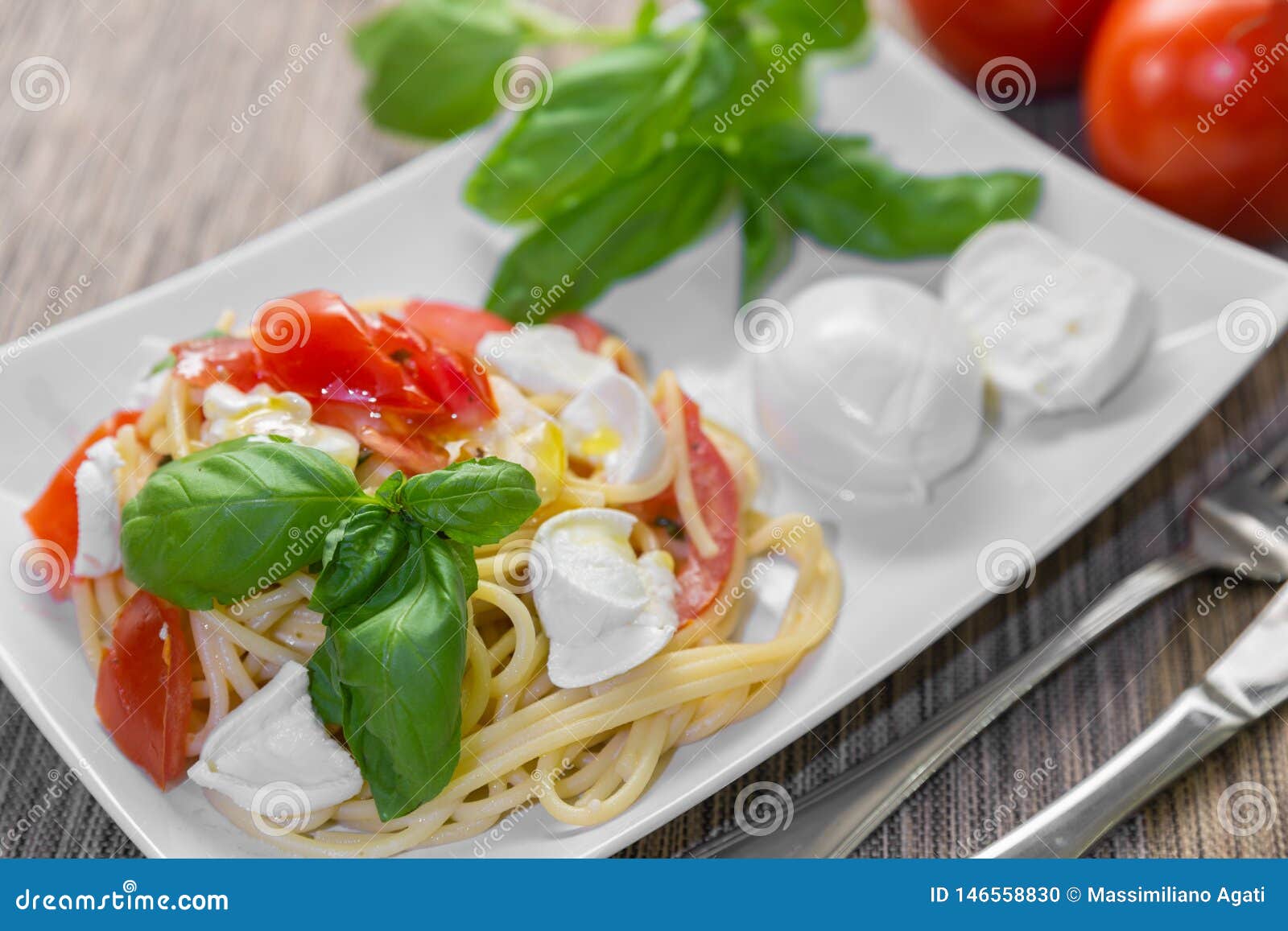 Spaghetti with Fresh Tomatoes, Basil and Mozzarella Stock Photo Image
